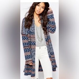 Free People Iona Wrap Knit Eyelash Cardigan in a blue and brown aztec print